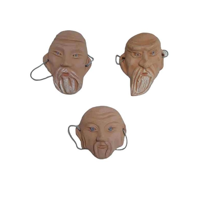 Tre maschere in terracotta